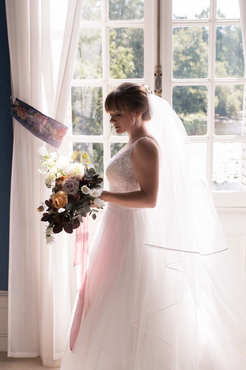 mariage romantique bouquet de fleurs robe de mariee voile loire atlantique chateau du pordor